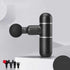 Compact black Mini Fascia Gun massage gun with four interchangeable heads for muscle relaxation and deep tissue therapy