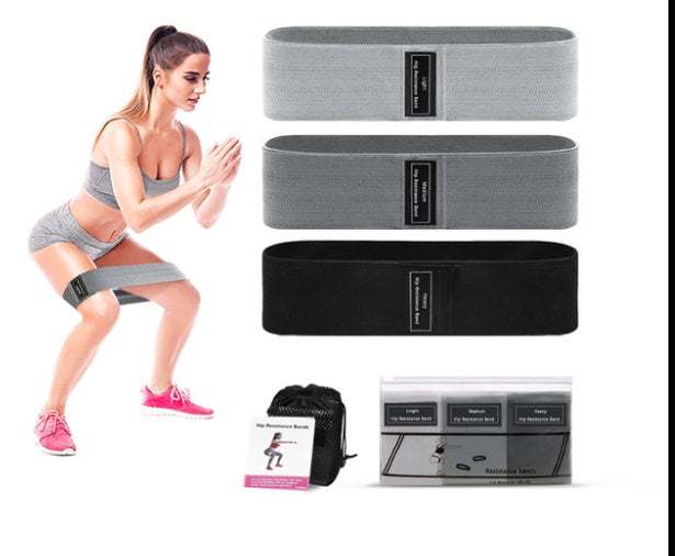 Set of fabric resistance bands in gray and black with carrying pouch, used for fitness and exercise.